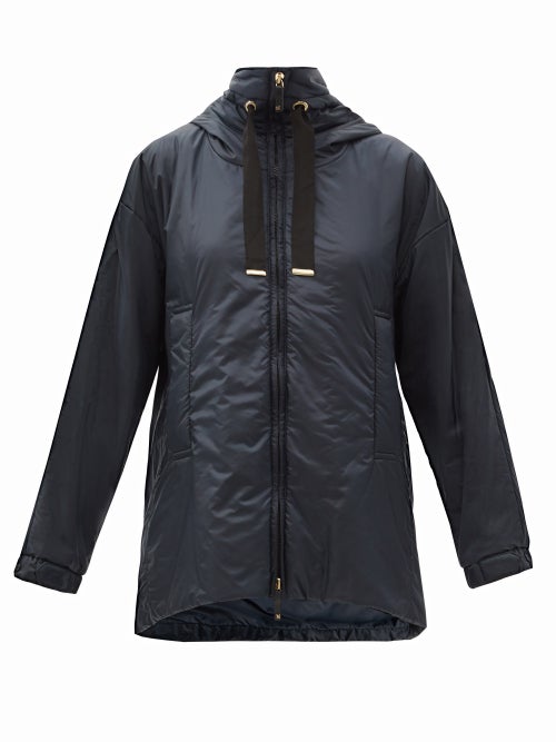 Max Mara - Max Mara's navy Greenfe jacket is padded with production offcuts including soft, insulati