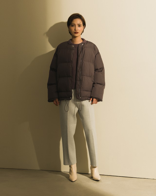 內鋪棉設計/下擺有抽繩設計/前有押釦拉鍊/側邊有口袋