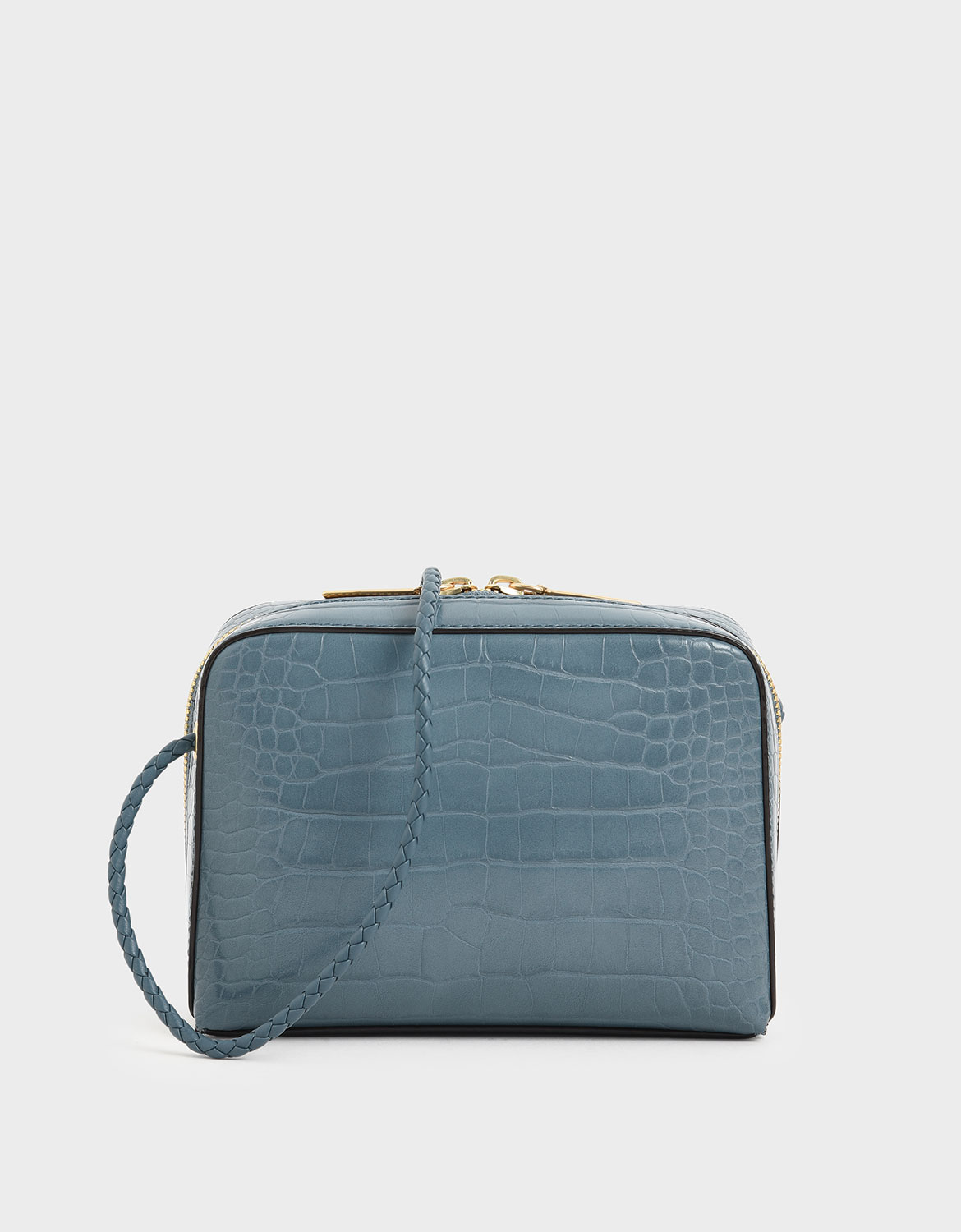 高雅的皇家藍讓鱷魚壓紋的氣質再上一層樓，拉鍊設計方便收納，輕鬆放進日常小物。