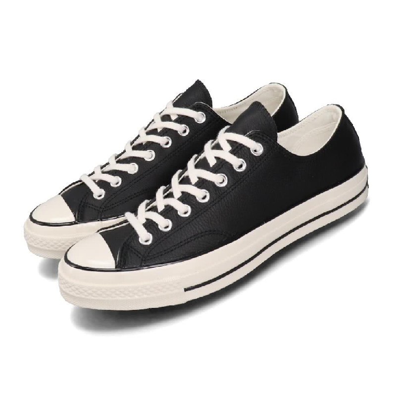 型號:167065C品名:CHUCK 70 OX配色:黑色,米白色鞋身採用柔軟霧面荔枝紋皮革，以極簡俐落風格穿出獨特自信魅力【鑑賞期及退貨注意事項】1. 本商城購物享有15天鑑賞期，提供一次免費退貨服