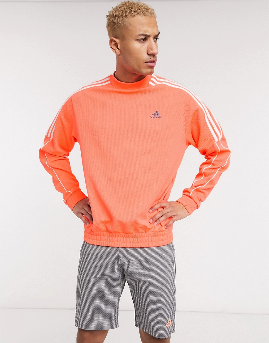 Sweatshirt by adidas A fresh addition Crew neck 3-Stripe branding Fitted trims Regular fit True to s