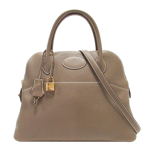 九成新 金屬局部有保護膜，局部些微髮絲紋 皮革邊角些微小磨痕