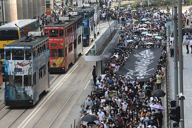 Hundreds Take To Street For Lunchtime Protest In Business District