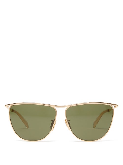 Celine Eyewear - Celine's gold Andy sunglasses lend a directional edge to the classic aviator silhou