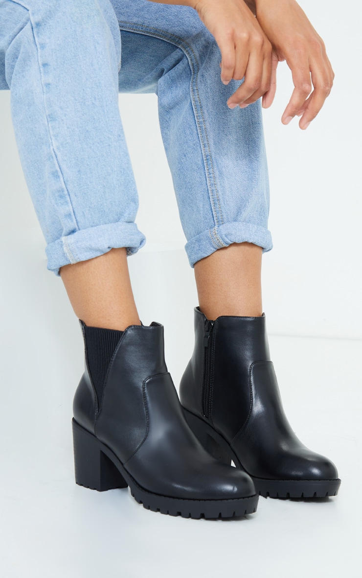 Black Basic Pu Cleated Sole Heeled Ankle Boots nDoll these boots are the perfect addition to your ne