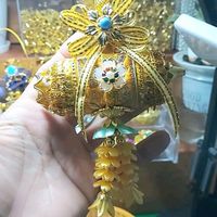 เหรียญโปรยทานบ้านคุณยาย