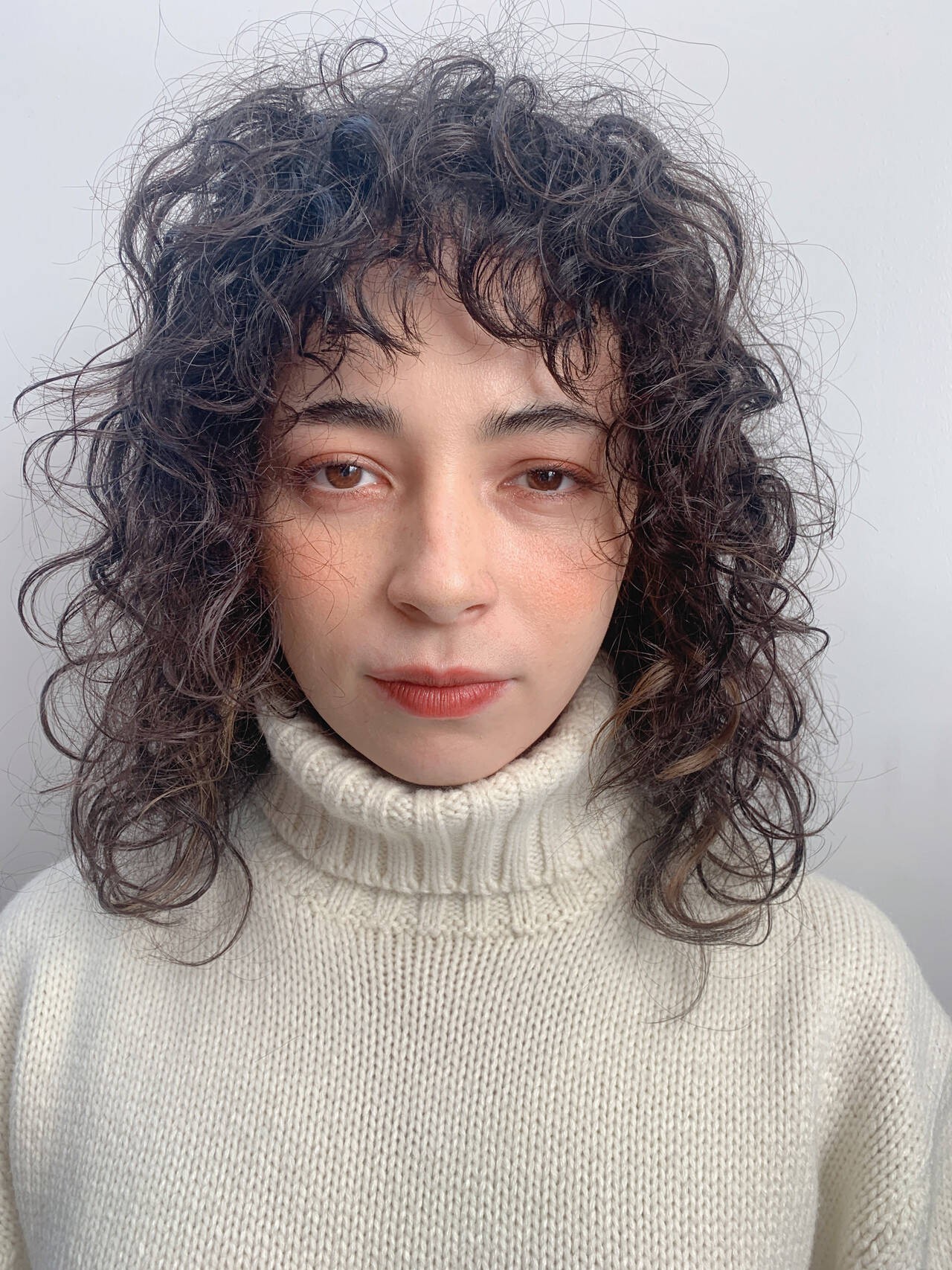 カール強めの くるくるパーマ が21年流