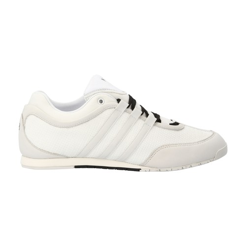 Adidas disrupts tradition with these bold Y-3 Sprint sneakers. The two-part notched sole is topped w