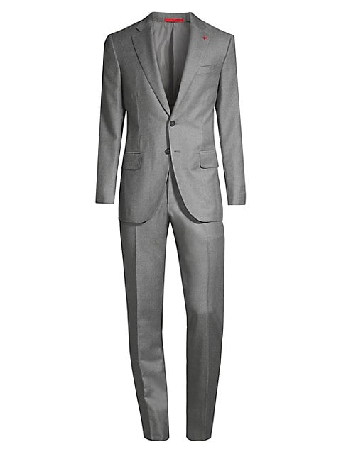 Dapper in a tailored fit, this wool suit is refined and timeless. Wool. Dry clean. Made in Italy. JA