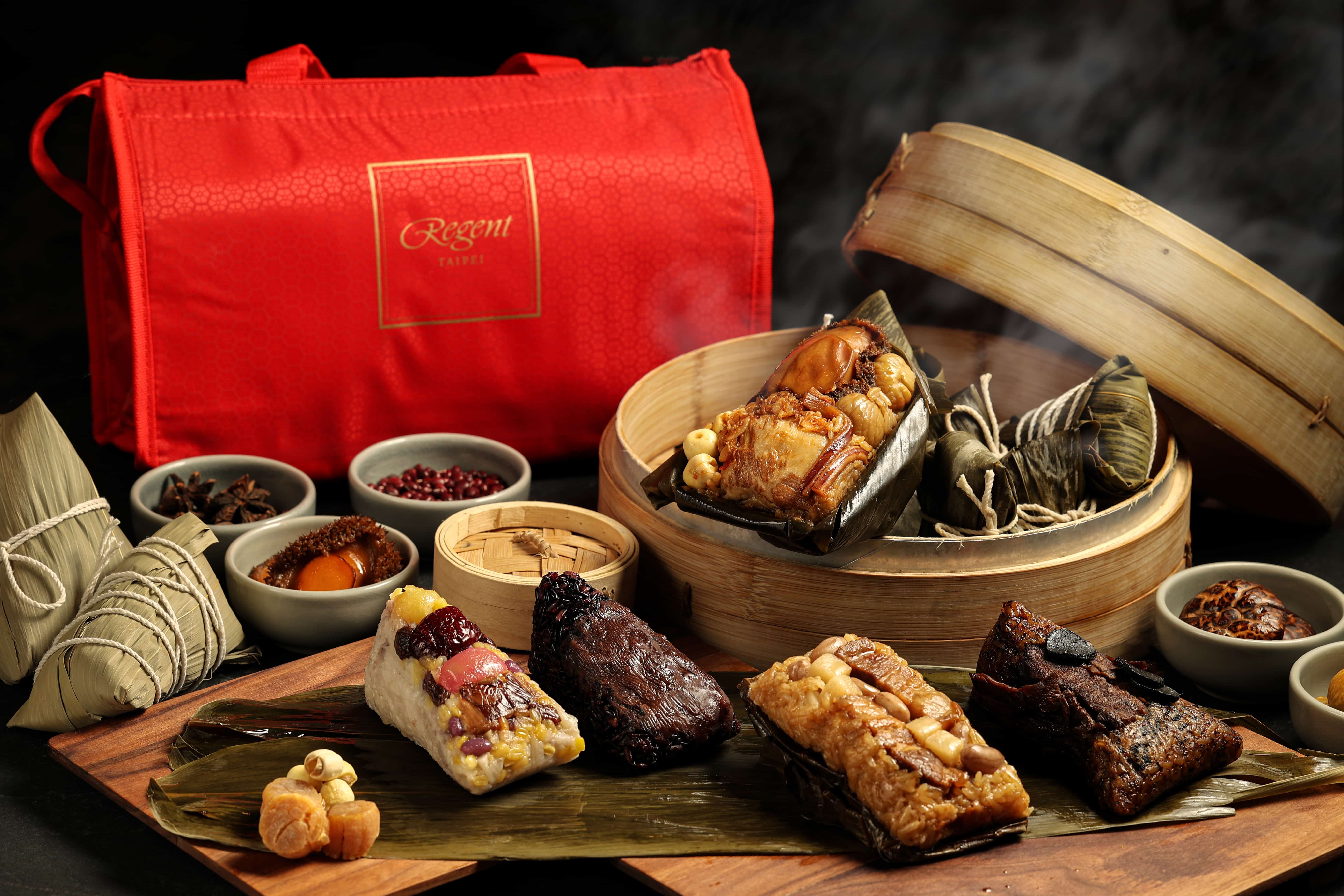 晶華酒店持續推出由冠軍鮑粽、松露牛肉粽、綠竹筍鮮肉粽、八寶芋泥粽和紫米豆沙粽等五款榮獲媒體評比冠軍粽組成的經典熱賣款「冠軍粽香禮盒」（圖片提供/台北晶華酒店）