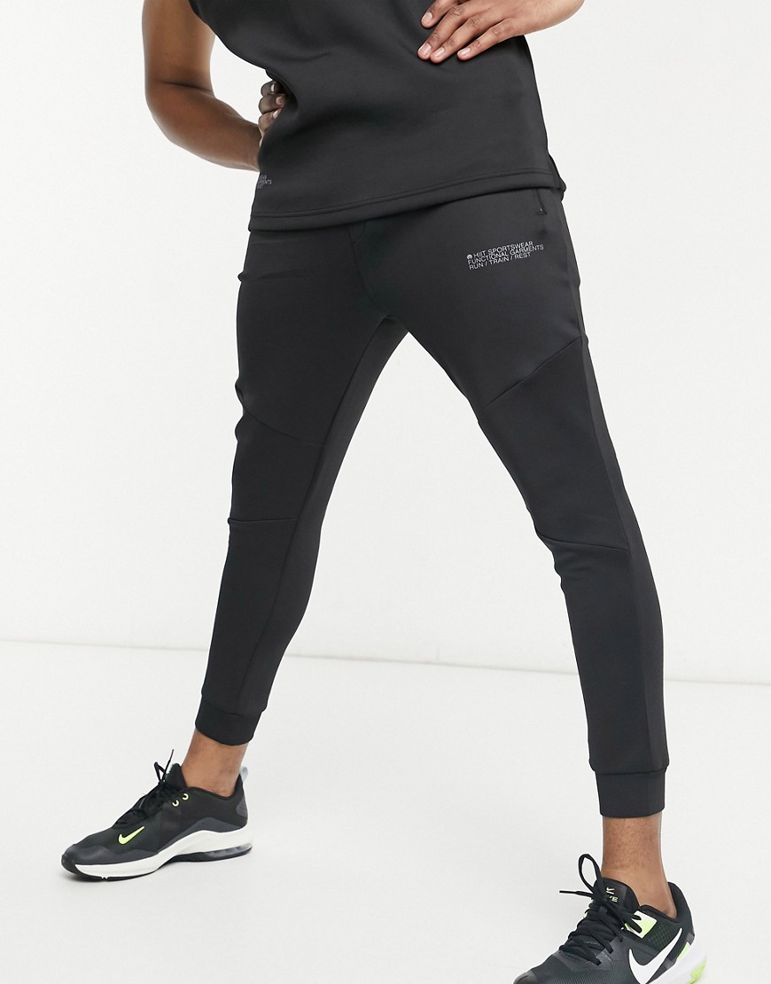 Joggers by HIIT Fresh gear, fresh motivation Adjustable toggle waist Zip side pockets Text print to 