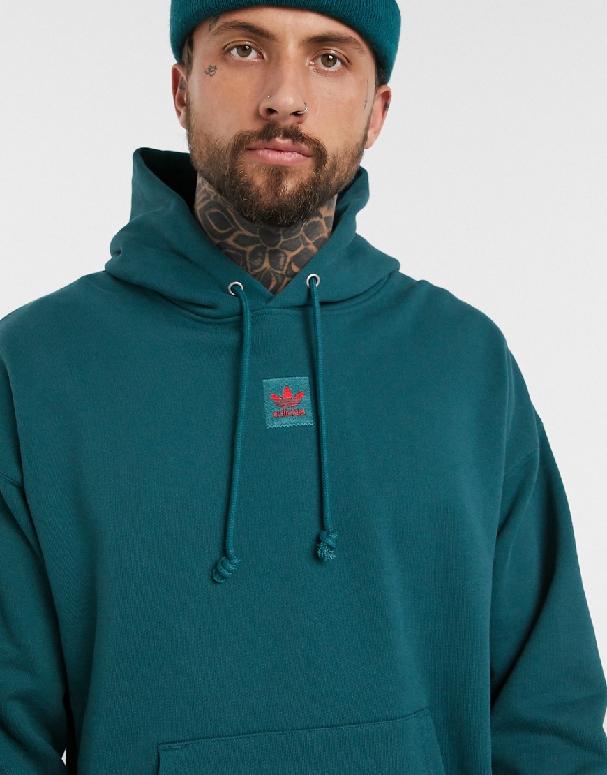 Hoodie by adidas Snowboarding The original cosy layer Drawstring hood Over-the-head style Pouch pock