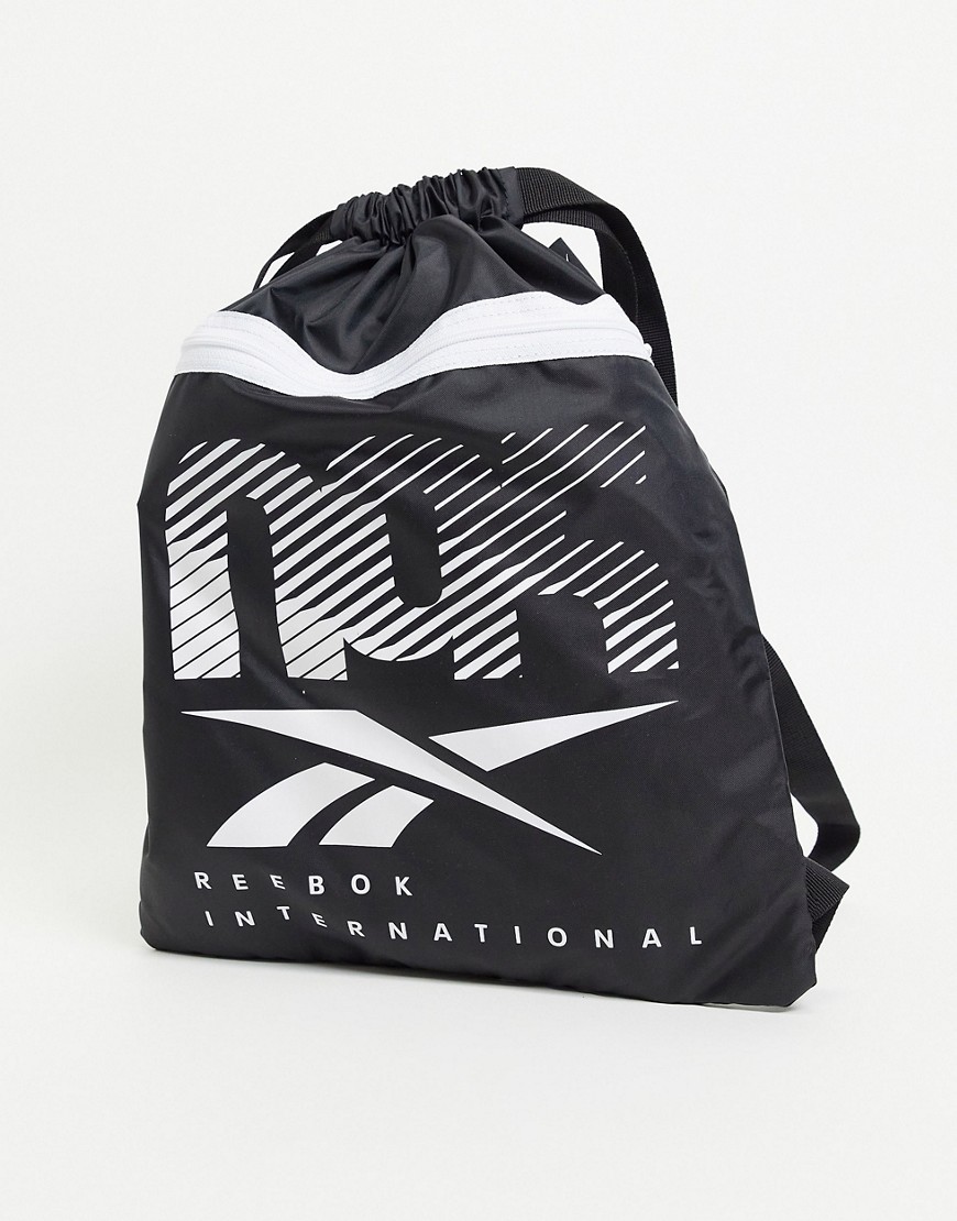 Bag by Reebok New bag, new outlook Drawstring fastening Branded print to front Reebok logo patch Ext