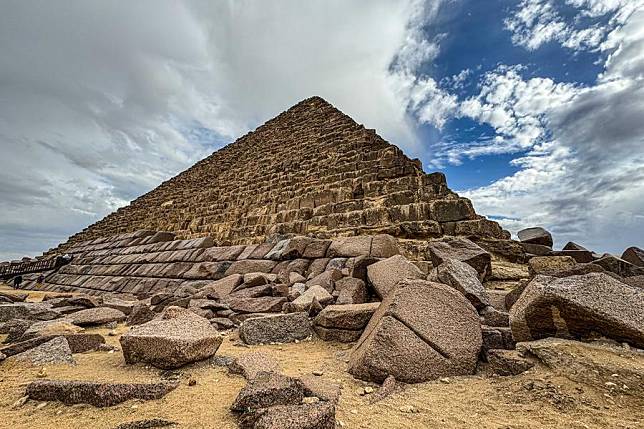 This photo taken on Jan. 31, 2024 shows the Pyramid of Menkaure in Giza, Egypt. The plan of Egypt's Supreme Council of Antiquities (SCA) to clad the Pyramid of Menkaure, one of the famed three pyramids of Giza, with granite blocks raised debate in the country as some archeologists are concerned it would ruin the originality of the 4,500-year-old monument. (Xinhua/Ahmed Gomaa)