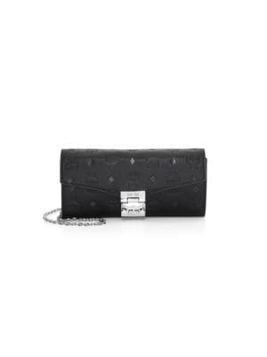 Allover embossed logo lends an iconic design to this wallet.; Removable chain shoulder strap; Flap p
