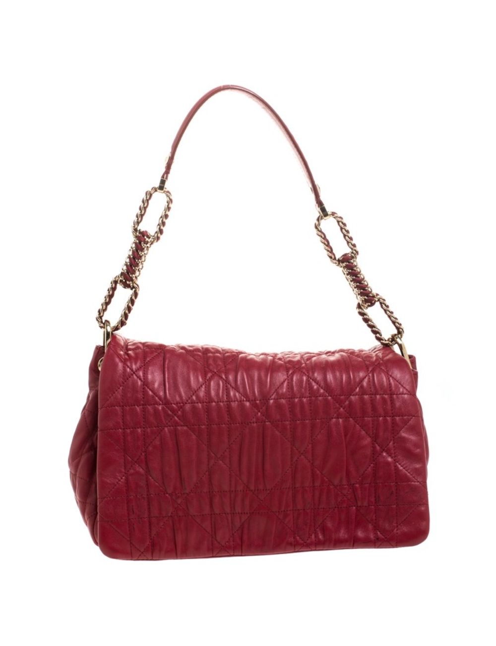 通過裝飾Dior這款經典的紅色皮包，成為本季的潮流引領者。包的內部有精美的織物襯裡，並配有單獨的隔層，可存放您的必需品。帶有翻蓋封口，手提包的頂部提手飾有金色五金配件。這款Delidior手提袋將為您