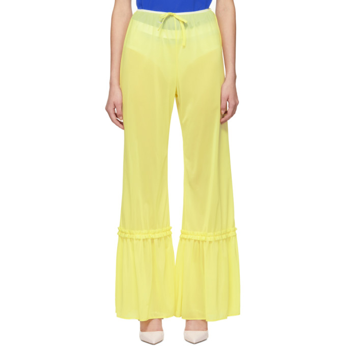 Flared woven nylon trousers in lemon yellow. Mid-rise. Tonal bow at front waistband. Button fastenin