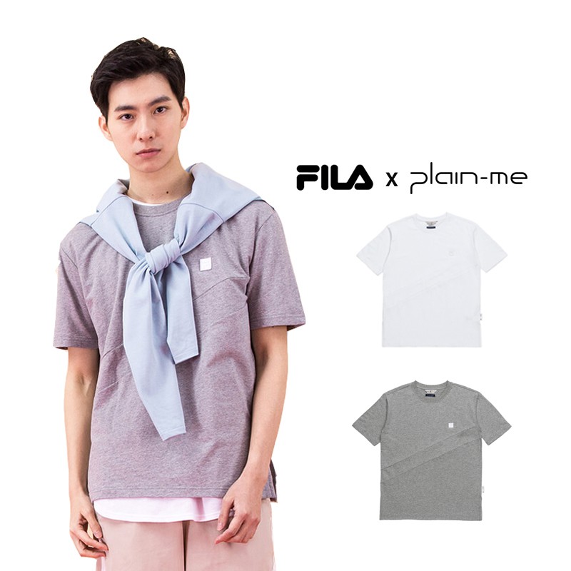 FILA x plain-me共同企劃系列商品。同色拼接剪裁設計。側邊開衩設計。版型偏小，建議可選擇大一個尺寸。(Model 178cm/60kg 著用L號)材質：棉100%產地：臺灣建議洗滌：可冷水