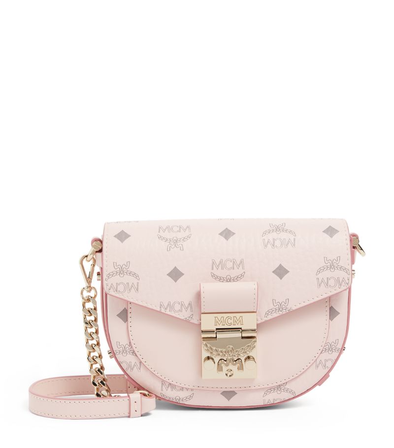 Reimagining one of its long-standing styles in a fanciful powdery hue, MCM presents the coveted Patr