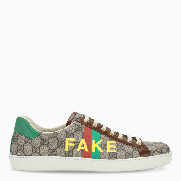 Low-top sneakers by Gucci in beige and ebony GG Supreme canvas, a material with low environmental im