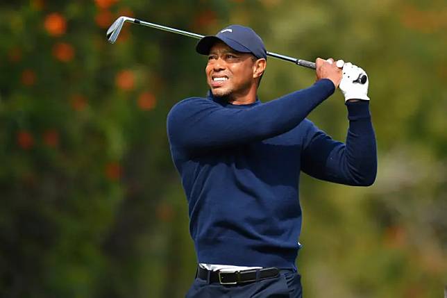 美國高爾夫傳奇老虎伍茲（Tiger Woods）相隔10個月重返PGA美巡賽，卻因流感退賽。（圖／美聯社／達志影像）