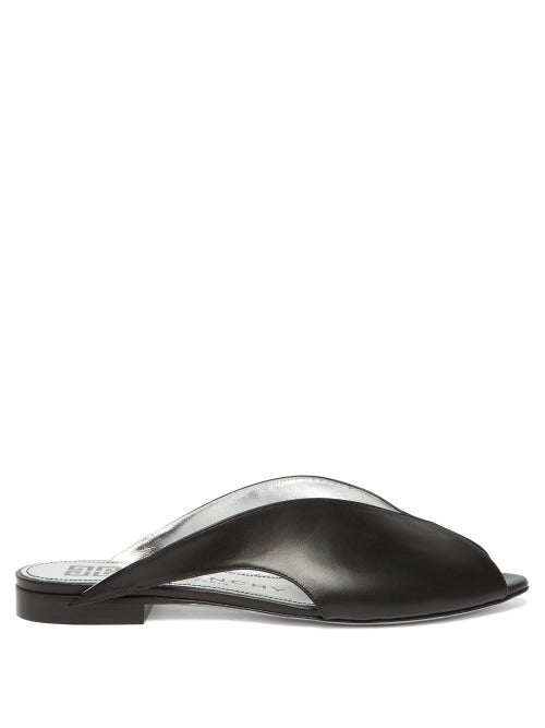 Givenchy - For a directional riff on the classic sandal silhouette, Givenchy presents these peep-toe