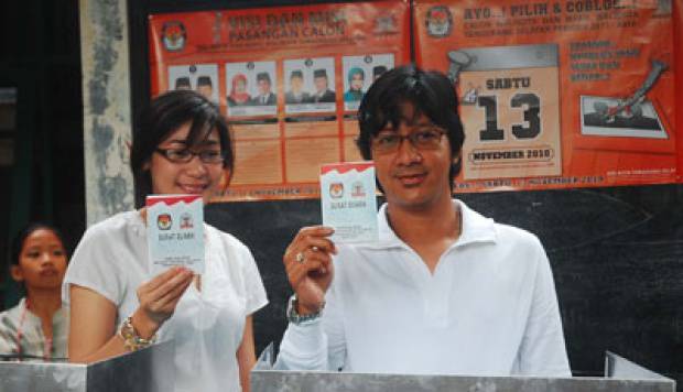 Andre Taulany dan istri