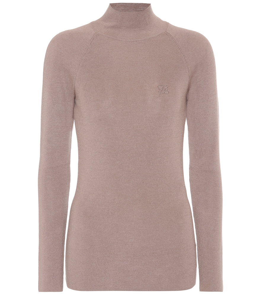 Keeping it stripped back is sometimes best, as this fawn-brown sweater from Fendi proves.