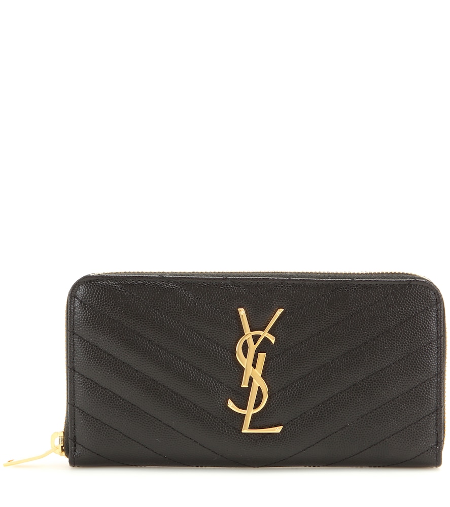 Quilted in a chevron pattern, Saint Laurent's logo-embellished wallet is a chic essential.