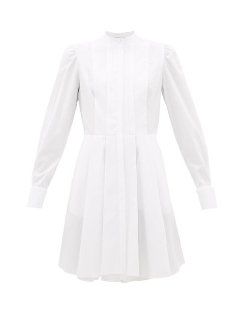 Alexander McQueen - The knife-sharp pleats that define Alexander McQueen's crisp white cotton shirtd