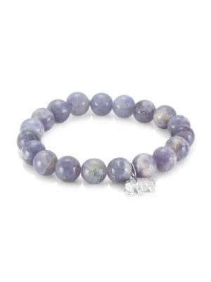 Lovely iolite beaded bracelet embellished with a delicate 14K white gold and diamond elephant charm.