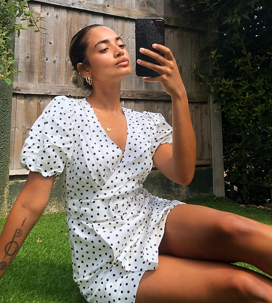 Petite dress by Forever New Worn and shot by one of our models at home All-over polka-dot print V-ne
