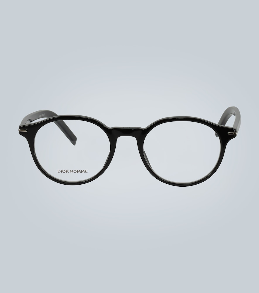 Designed in Italy, this pair of classic optical frames from Dior Eyewear sport a rounded shape, blac