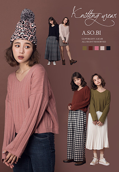 領口/袖口捲捲邊。下襬拼坑條織紋。長度是短版設計。