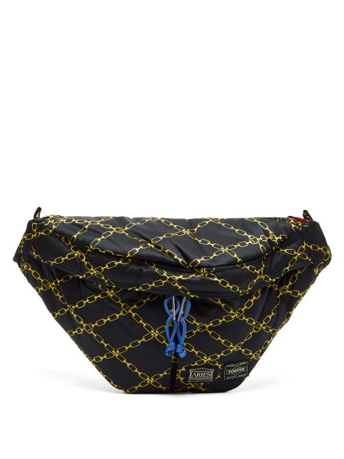 Aries - This black cross-body bag is part of a collaboration between Aries and accessories label Por