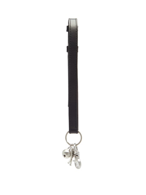 AMI - AMI's playful outlook is reflected by this key ring, which features an adjustable black leathe