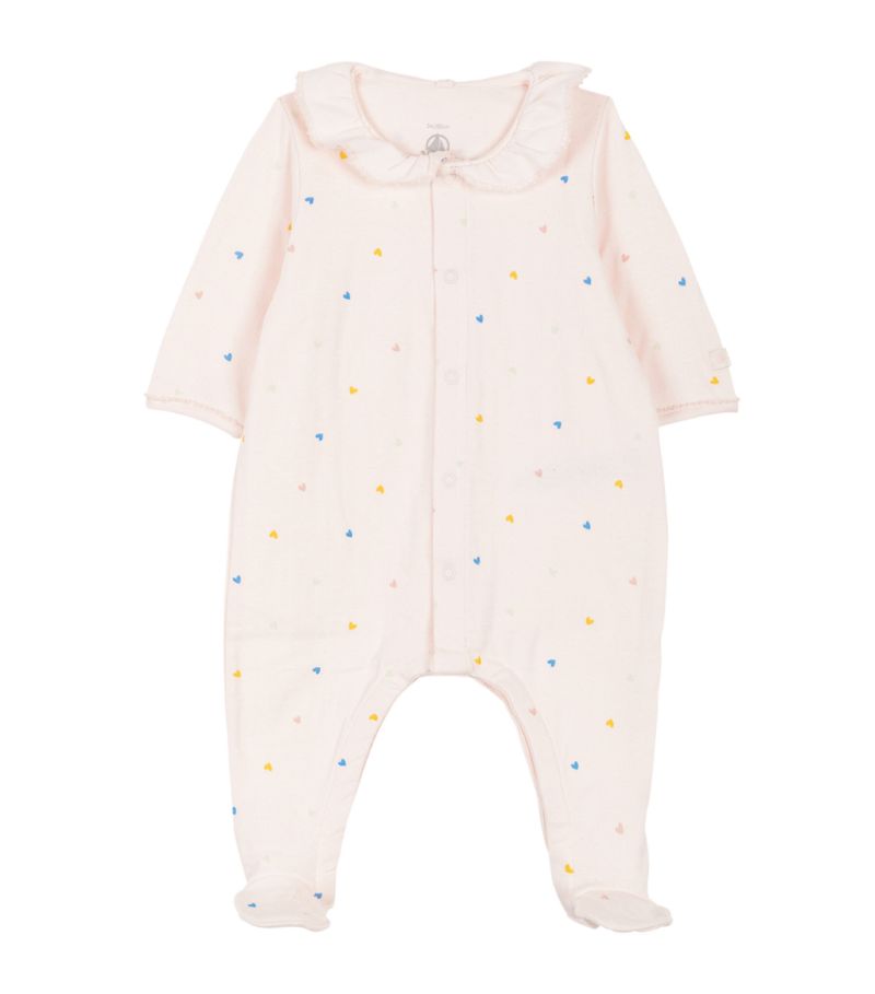 Share the love with your little one through this Petit Bateau all-in-one. Printed all-over with spor