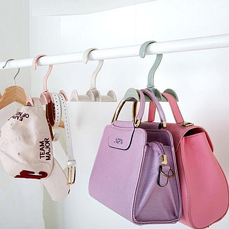 將包包掛起來收納，適合包包的提袋，不易變形