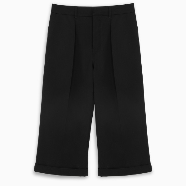 Flared trousers by Loewe in black wool featuring pleated design, cropped fit, belt loops on the fron