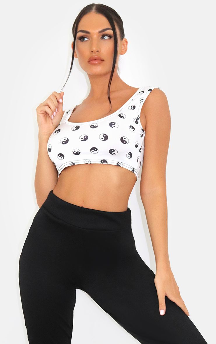 White Ying Yang Printed Cropped VestAdd some zen to your look with this vest Featuring a white mater