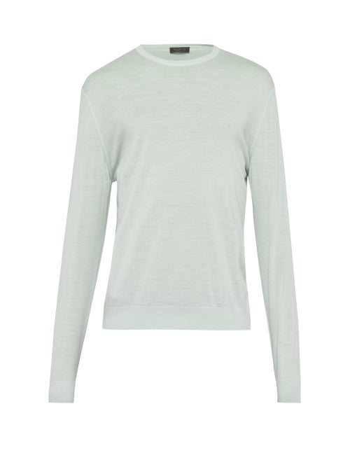 Prada - This mint sweater from Prada highlights the quality and sophistication of the label. Crafted
