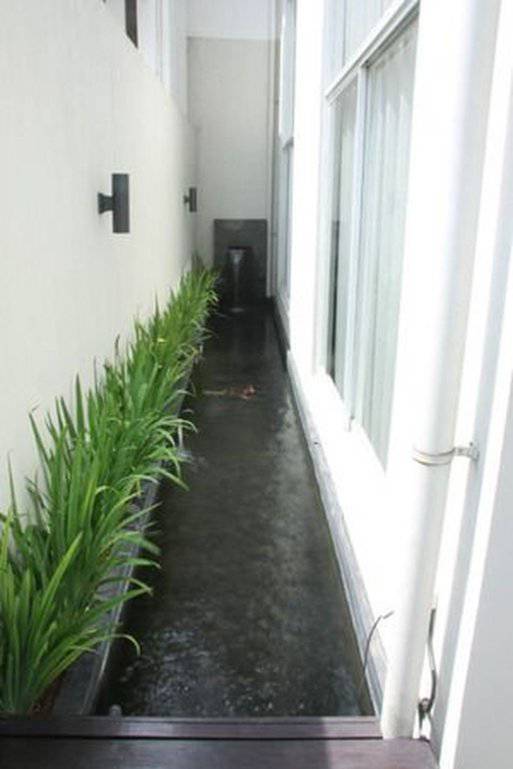 Buat Rumah Sejuk Ini 12 Inspirasi Desain Kolam Ikan