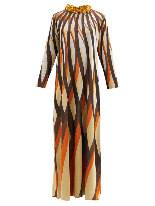 Gucci - The kaleidoscopic orange and brown stripes of this beige Gucci dress channel the free-spirit