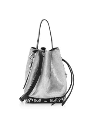 Convertible bucket bag crafted of lush calf hair with a striking metallic finish and logo trim.; Ope