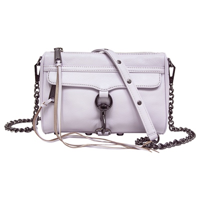 品牌特色，永不退流行小巧實用，簡約攜帶便利精湛皮革工藝，幹練俐落右側皮革輕微髒汙，參照【圖三】