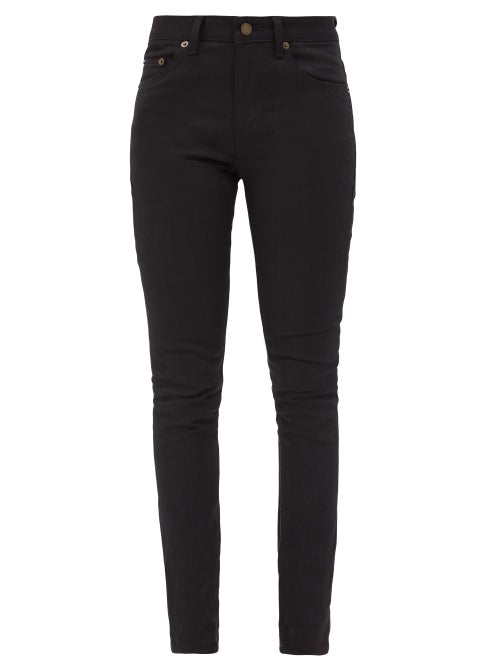 Saint Laurent - First pioneered by Saint Laurent almost a decade ago, the slim fit of these black je