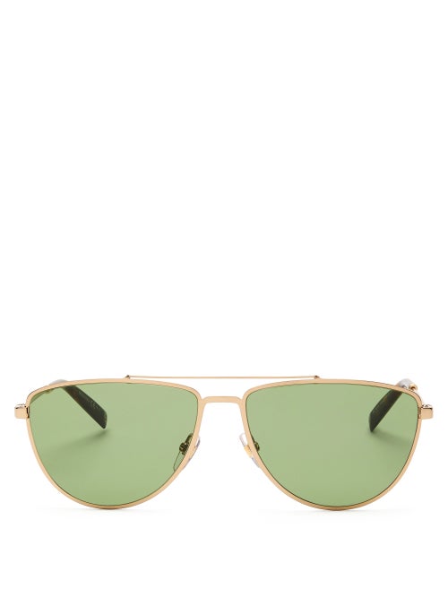 Givenchy - Givenchy's gold metal sunglasses are a streamlined expression of aviator styles, which we