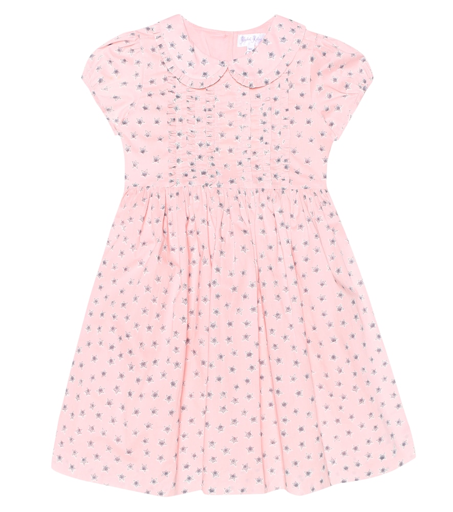 Your little one will love this star-printed dress from Rachel Riley, rendered in a rosey pink hue.