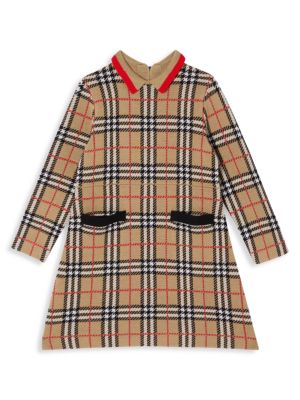 A long-sleeved merino wool dress in jacquard-woven vintage check, styled with a tipped point collar.