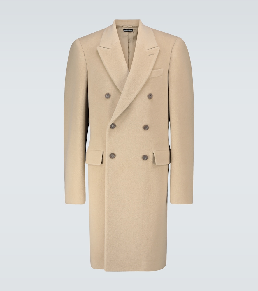This oat beige coat from Balenciaga is made from a soft alpaca and wool blend, has oversized structu